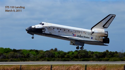STS133LandingLaunchDogs1.jpg